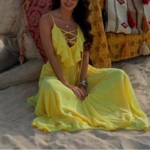 yellow flowy low cut dress